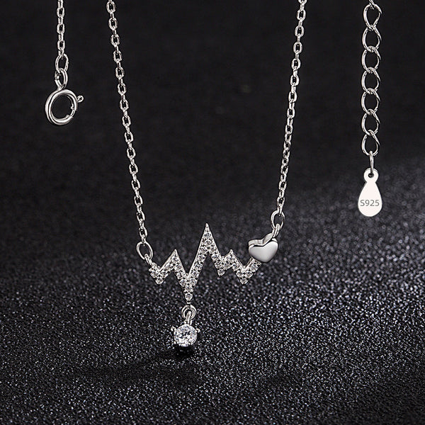 Silver Heartbeat Pendant Necklace